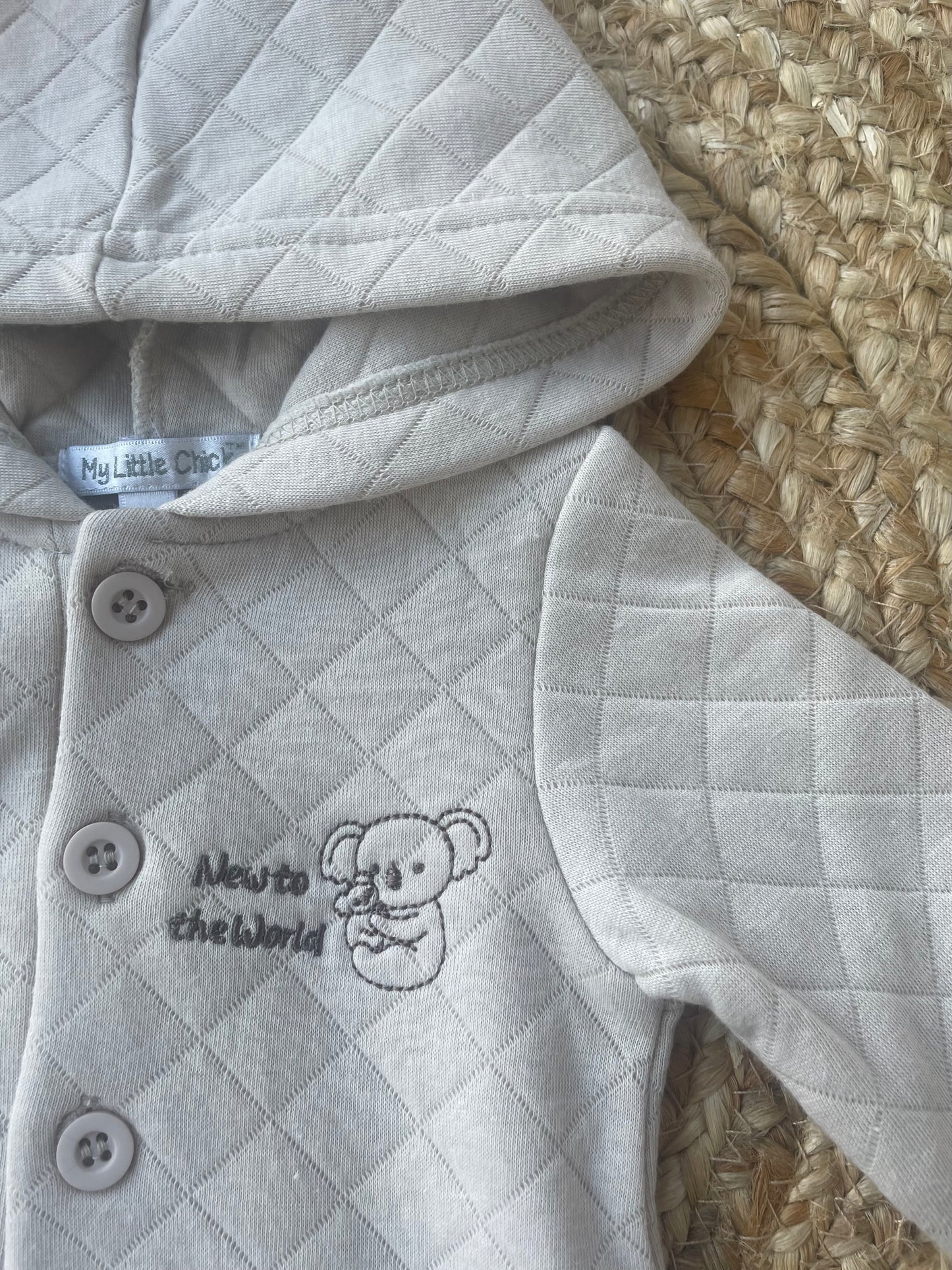 New to the World Quilt Romper